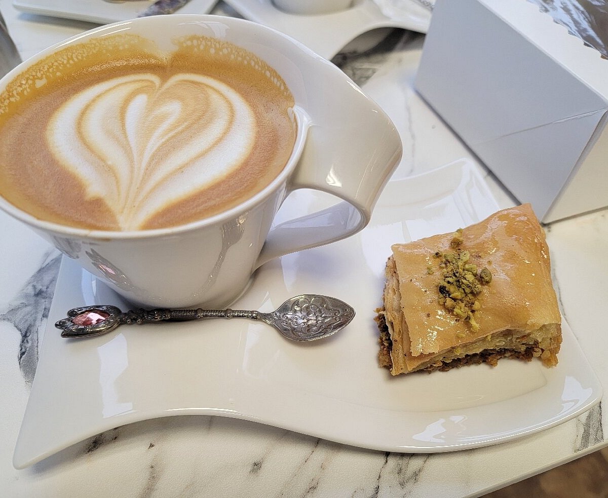 Sunshine Spice Bakery and Cafe signature dishes Cardamom Rose Latte, Pistachio Baklava, Saffron Macarons, Turkish Delight